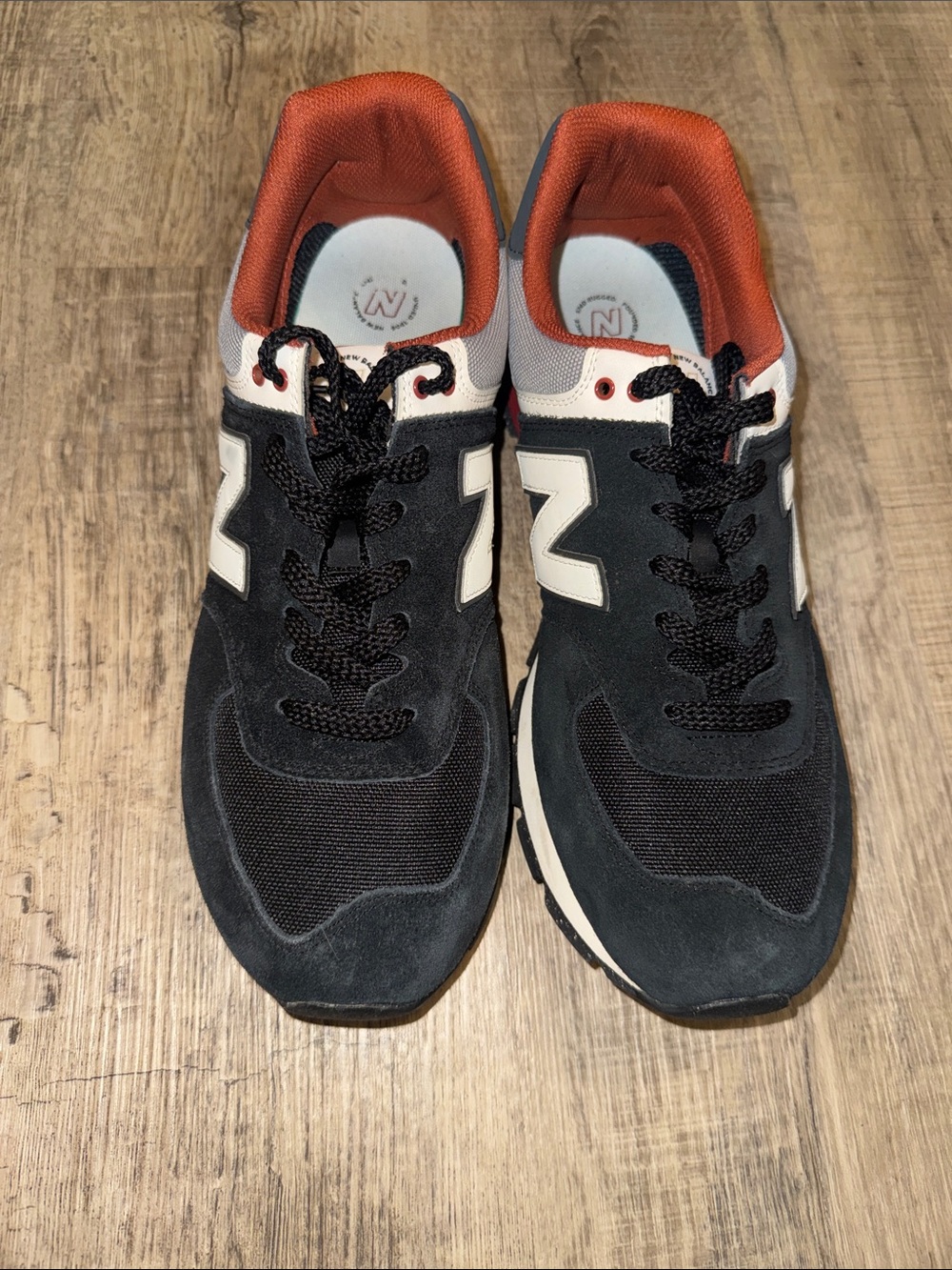 New Balance Black and White Sneakers with Orange Lining